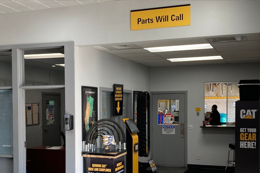 A Cat hydraulic hose display and electronic machine information center at the Eugene parts will call