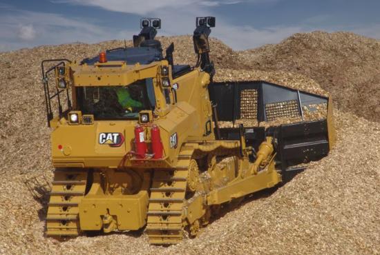 D8 Dozer working in a wood chip stock pile