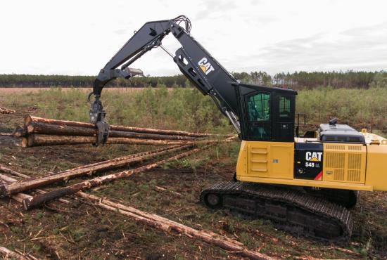 Grapple with Under/Under Heel shoveling logs Grapple with Under/Under Heel shoveling logs