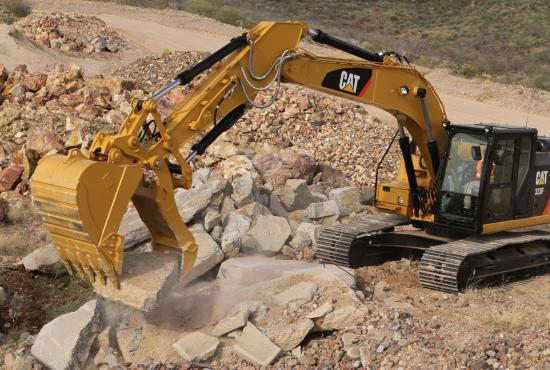 Ditch cleaning with coupler and clean-up bucket. Ditch cleaning with coupler and clean-up bucket.