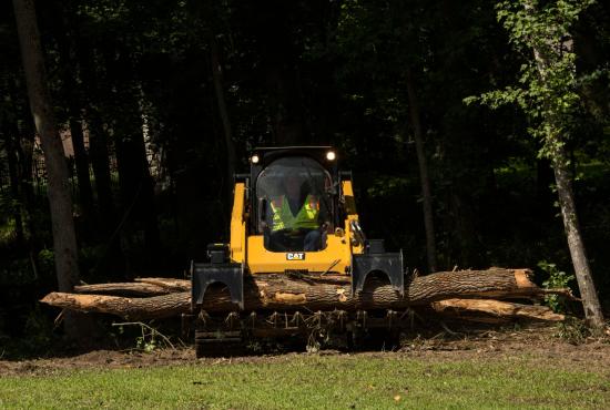 Cat® Grapple Rake Removing Fallen Logs Cat® Grapple Rake Removing Fallen Logs
